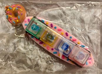 Clicker keychain lights up