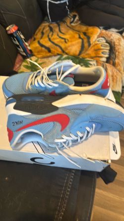 Light blue and red Nike air shoes