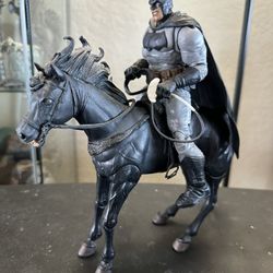 BATMAN RIDING MID-EVIL HORSE