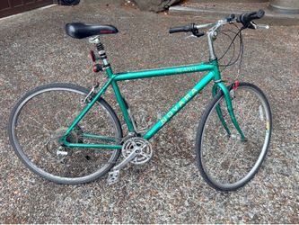 Novara Alance hybrid bike 24 speed 21” frame