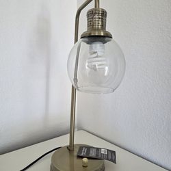 Lamp with outlet connection
