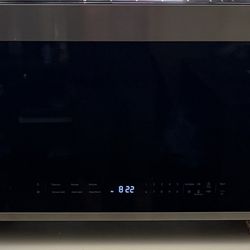 A hood stainless steel microwave
