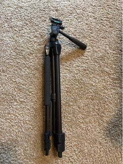 Adjustable tripod for cameras