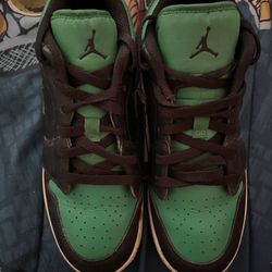 Green and black Jordan 1 trainers