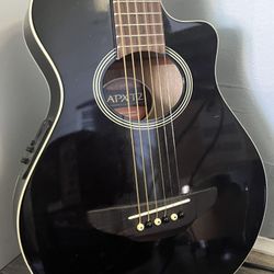 Yamaha acoustic/electric travel guitar 