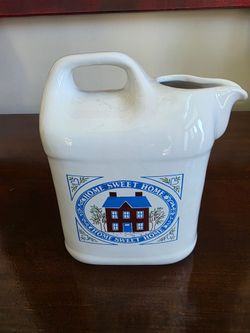 Ceramic creamer or milk jug with 'Home Sweet Home' decal