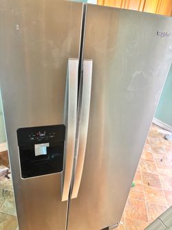 Combo washer and dryer & Whirlpool Stainless Steel Side-by-Side Refrigerator. And washer and dryer