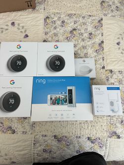 Ring doorbell with 3 Nest thermostats
