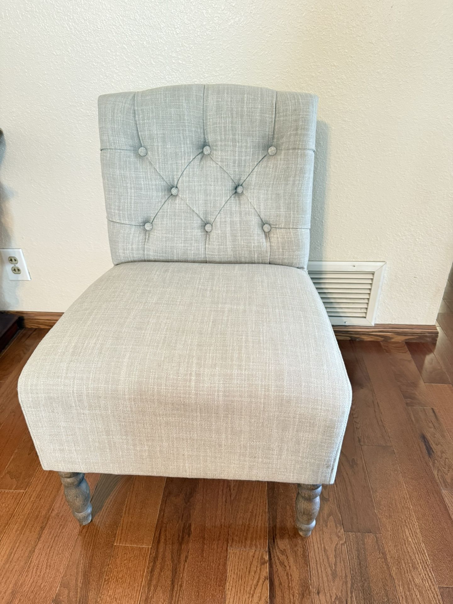2 fabric tufted chairs