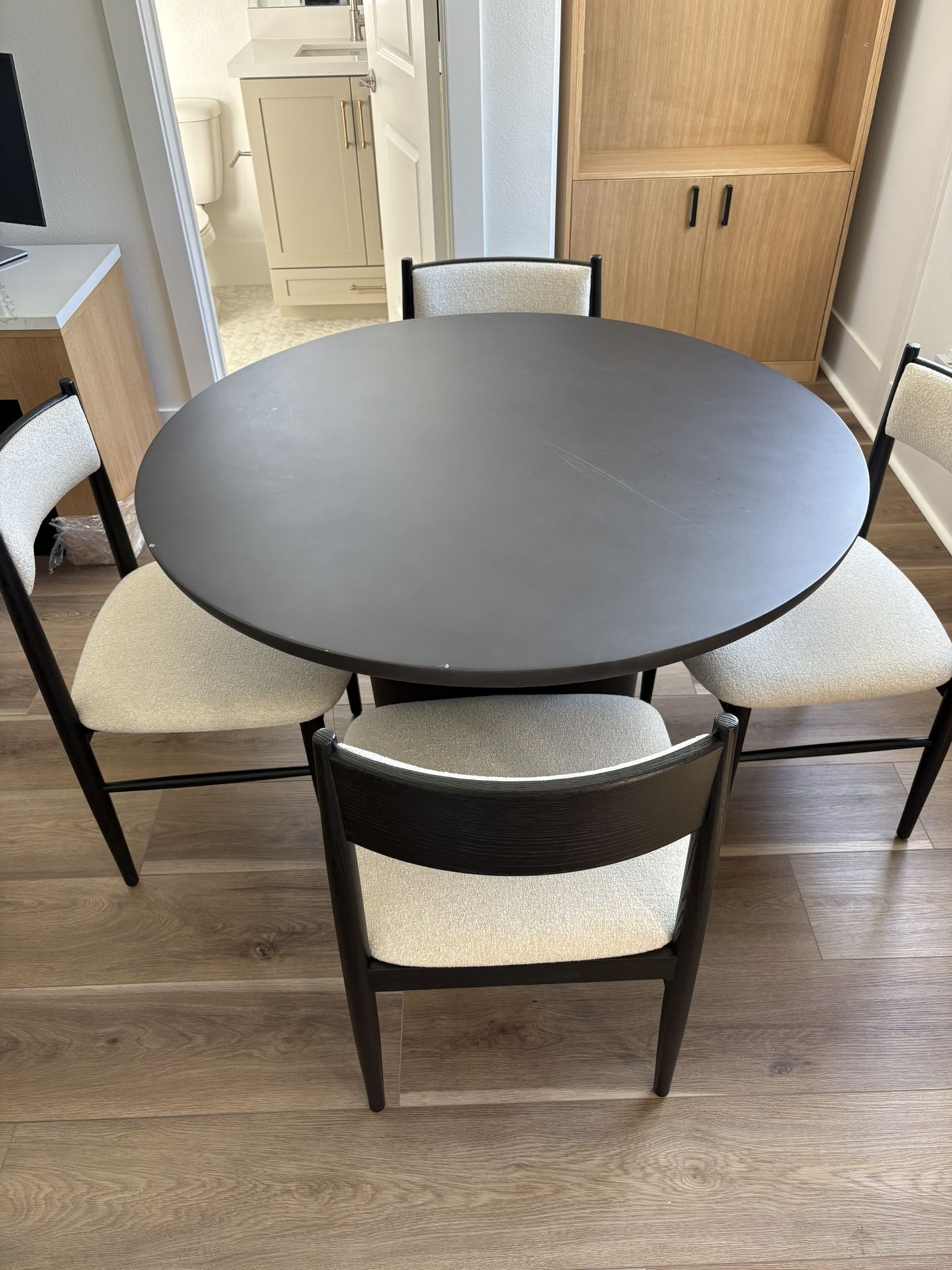 Lola 45" Round Black Concrete Dining Table – CB2 + 4 Crate & Barrel Petrie Dining Chairs