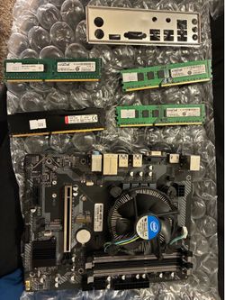 4x8 GB of Ram (32GB total) Gigabyte B85M series motherboard, i7 quad with a stock CPU cooler