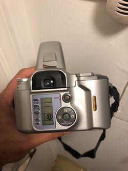 Olimpus SLR camera uses film.