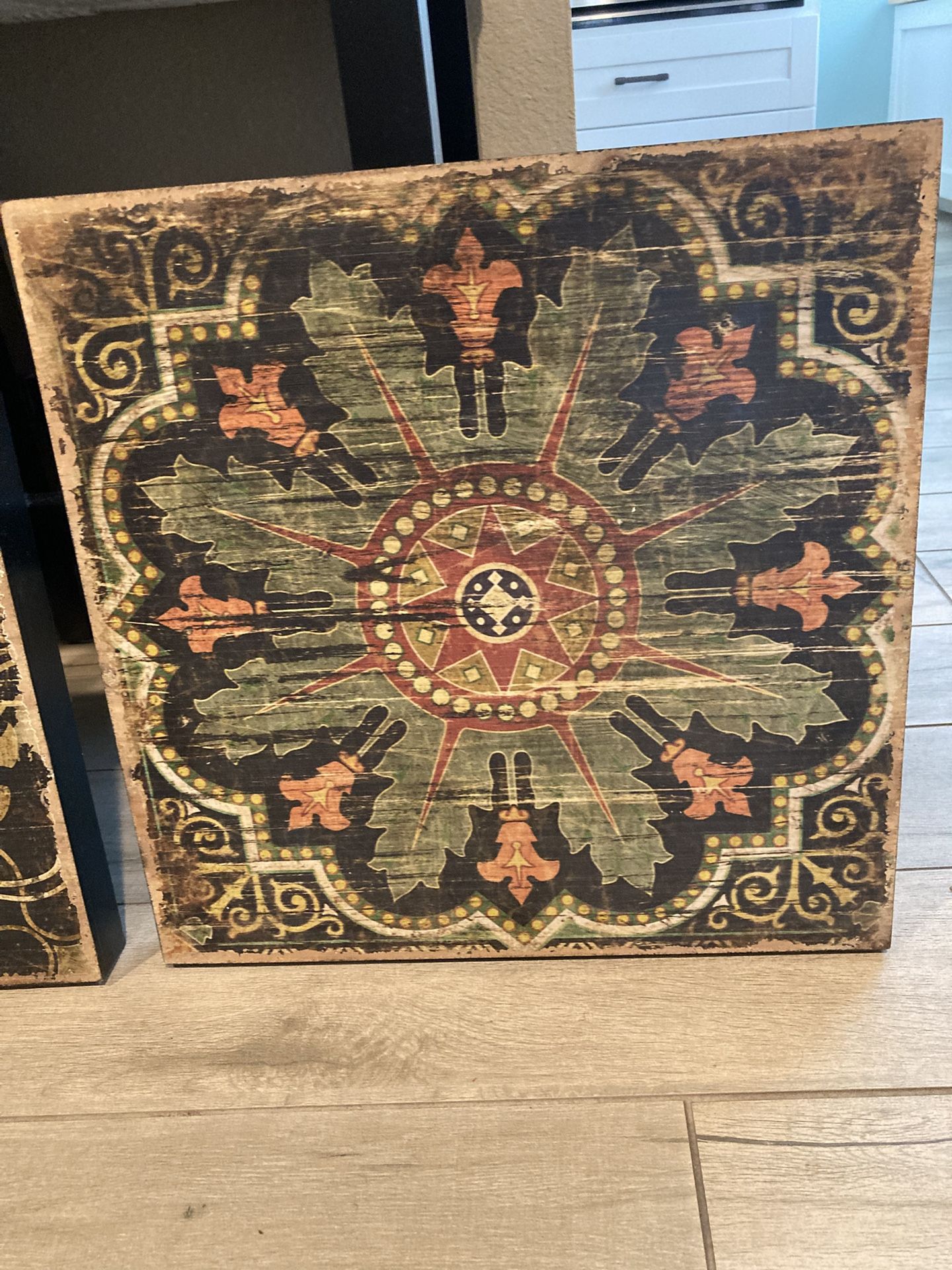 Set of three pictures painted on wood