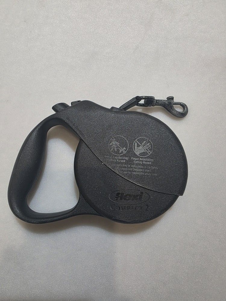 Dog Leash.
Retractable 16 ft.