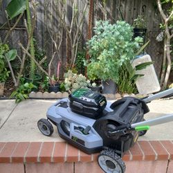 Lawn Mower EGO GREEN AND GREY ALMOST BETWEEN 3-4 FEET SIZE