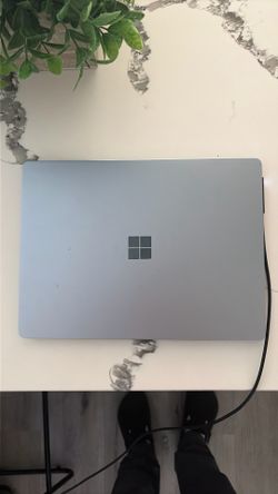 Microsoft Surface Laptop Go and Microsoft Surface Arc Mouse