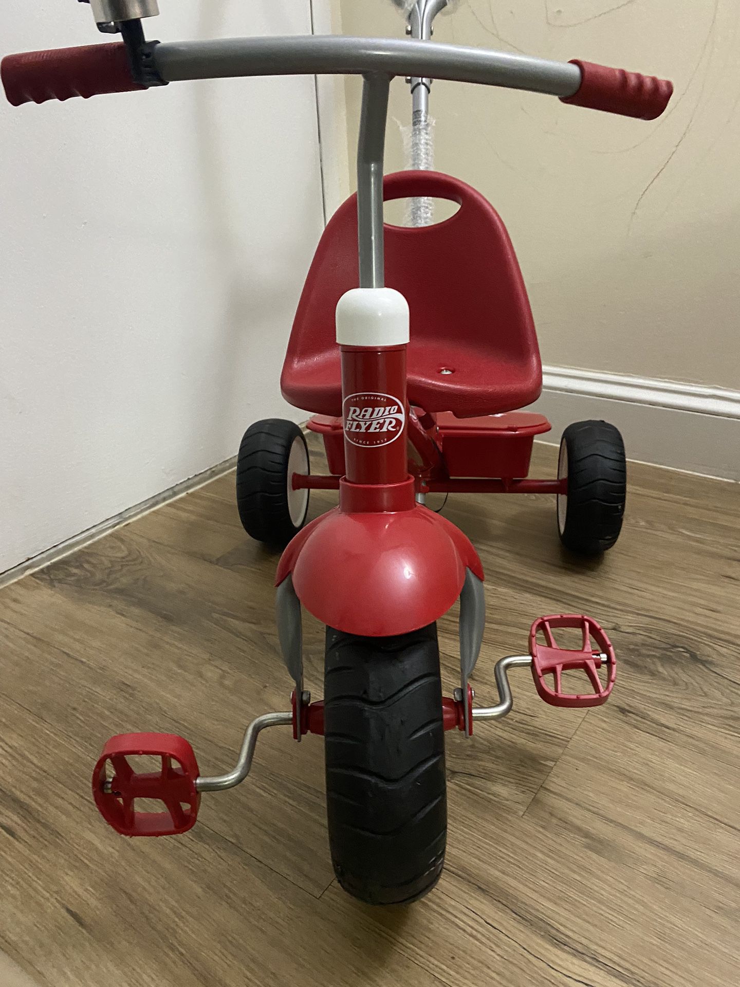 Radio Flyer Deluxe Steer & Stroll Ride-On Trike, Tricycle For Toddlers Age 2-5, Toddler Bike, Red