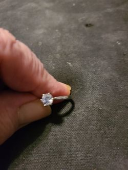 Size 6 silver ring with cubic zirconia stone. .