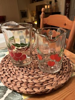 2 Tomato Pitchers