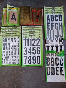 Stencils set of brass numbers, 5 " and stickers $,75.