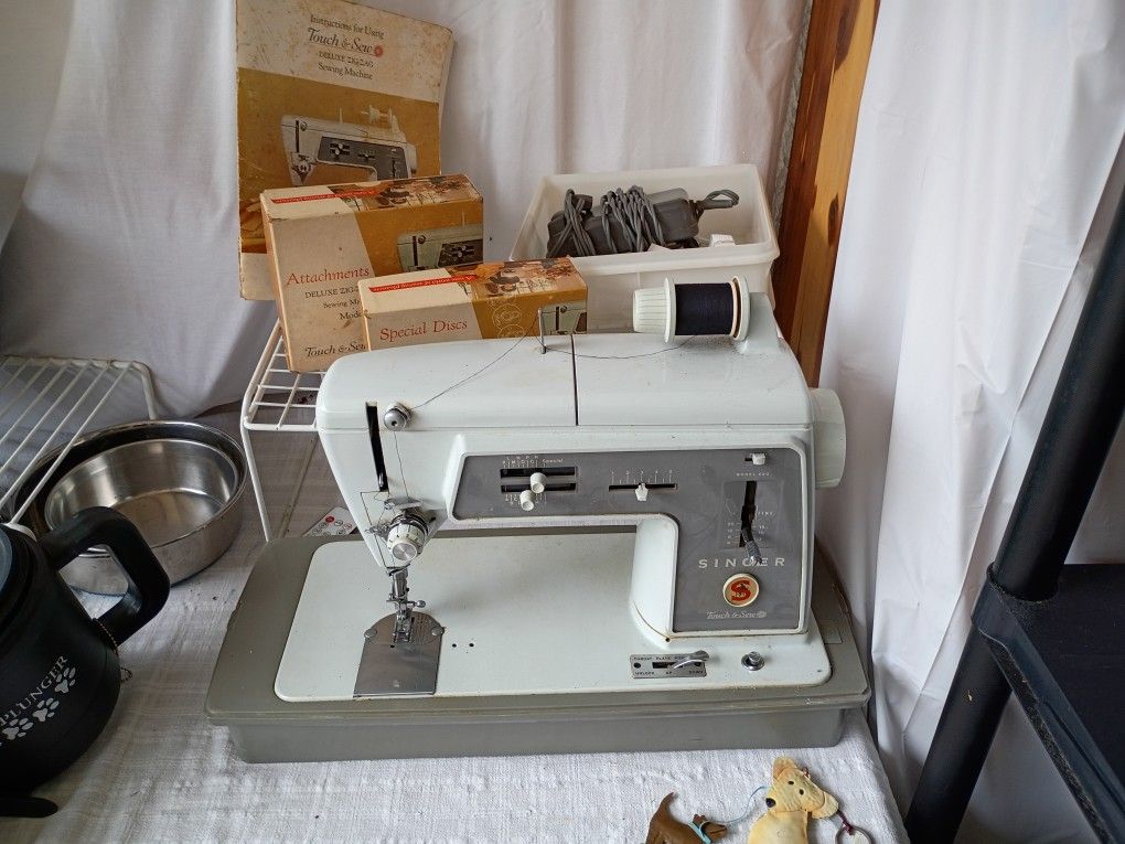 Singer Sewing Machine with Cabinet And Chair