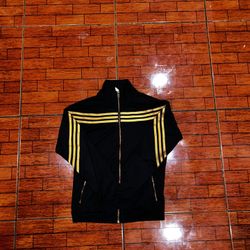 Kid size ten Adidas track top, excellent condition, willing to go lower