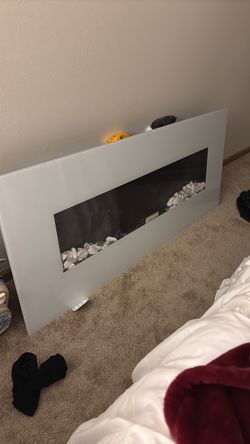 White glass fireplace stones included remote with it