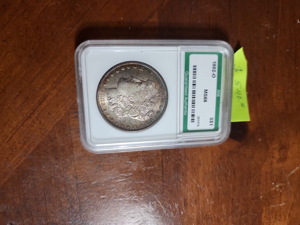 1902 MS66 Stains Morgan Silver Dollar