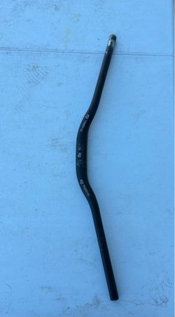 black 79Bike brand handlebars featuring a 3-inch rise and laser-etched centering marks for installation