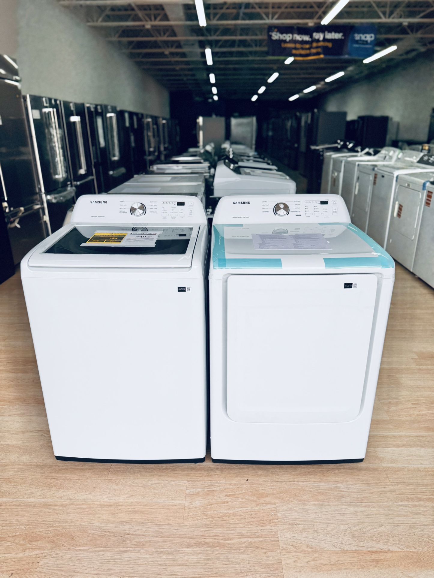 New Samsung 4.4 cu. ft. Top Load Washer with ActiveWave Agitator paired with a 7.2 cu. ft. Gas Dryer featuring Sensor Dry technology