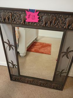 Mirror decoration with elephant metal