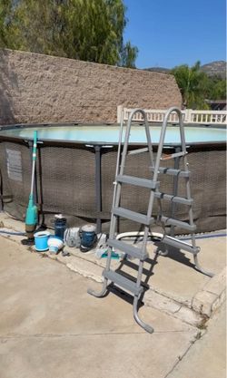 18 ft above ground pool and sand filter
