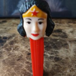PEZ Vintage Raised Star Wonder Woman Dispenser Hard Head 3.9 Thin Foot Austria

The PEZ Vintage Raised Star Wonder Woman Dispenser is a unique collect