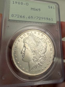 Rattler Morgan silver dollars in high grade undergraded old holders ms65 +