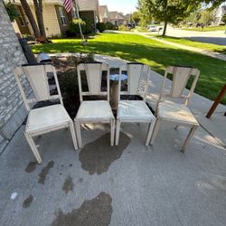 4 vintage white wooden chairs with flared, tapered backsplats & fluted legs