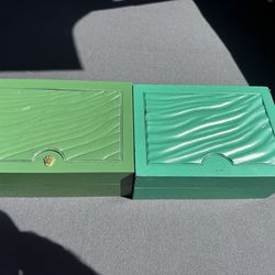 Rolex boxes.  2 medium size. One older and one newer. Newer one missing crown.  $150 for both