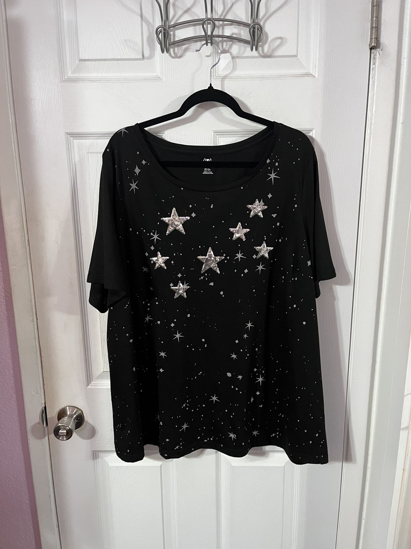 Women’s Size 22 / 24 Black Tunic Top with Stars. Brand new never worn.