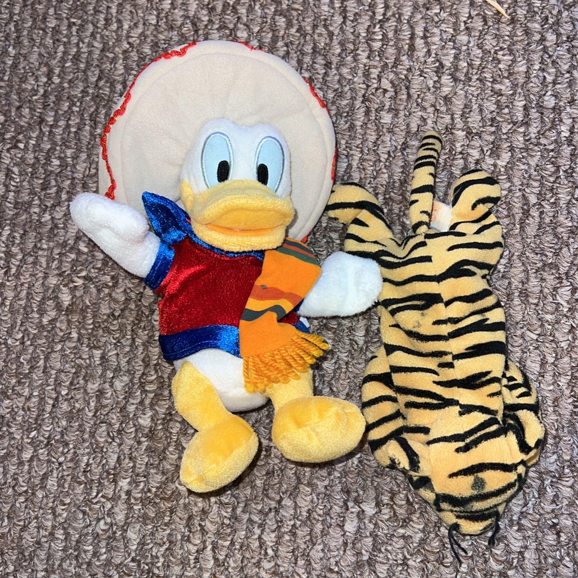Stuffed Animals (Disney Character And A Tiger) 