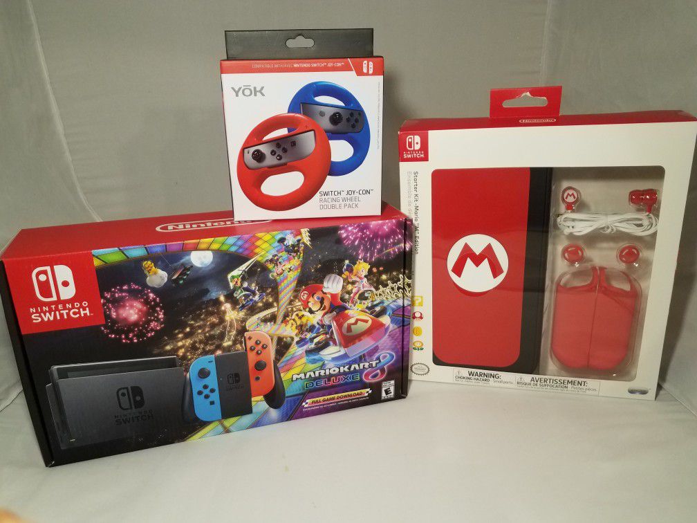 Brand new Nintendo Switch Mario Kart bundle.With accesories and 2 wheels. Everything Brand new. Great gift.