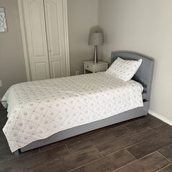 Twin bed with mattresses