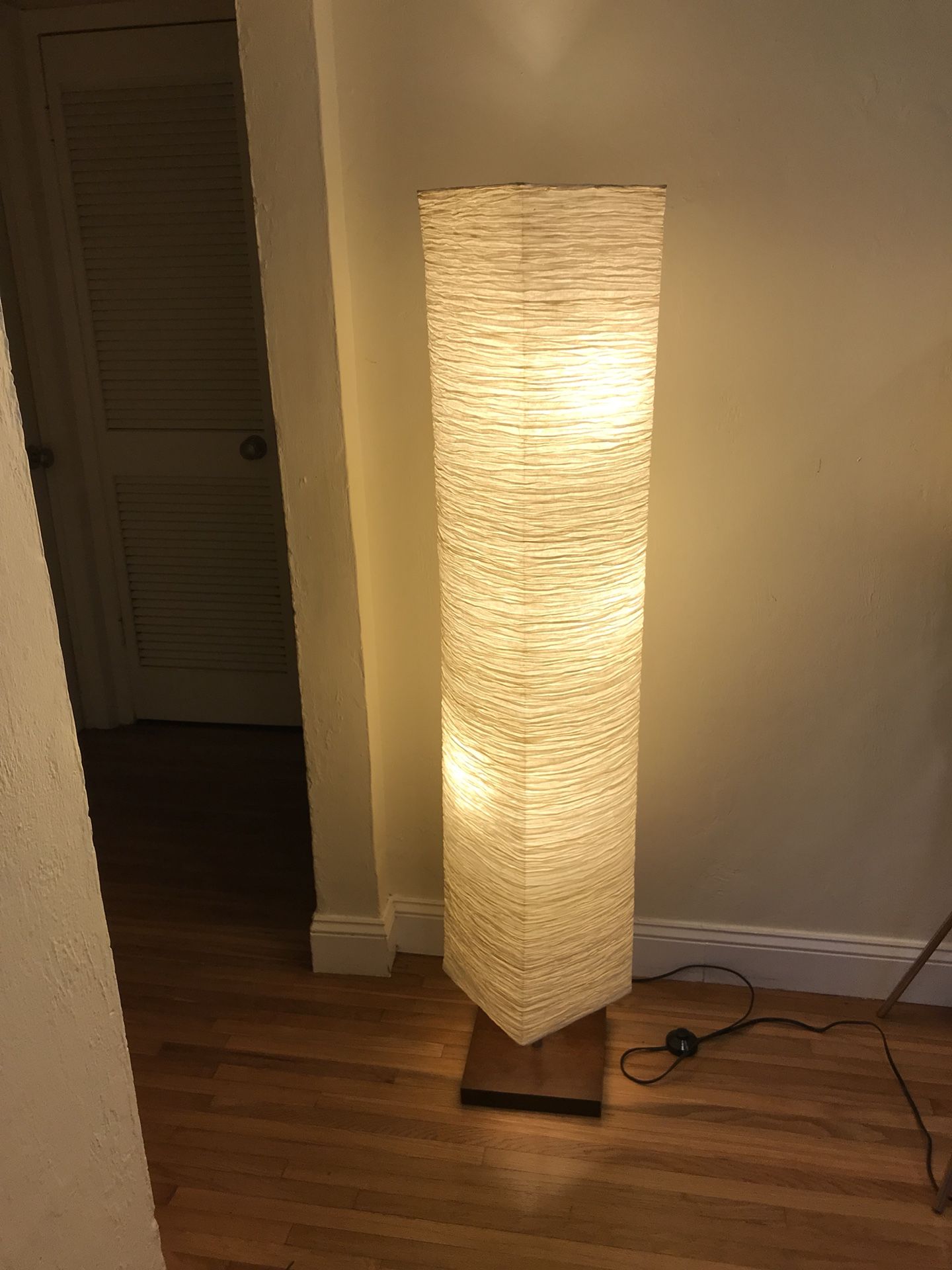 Floor lamp with three light bulbs