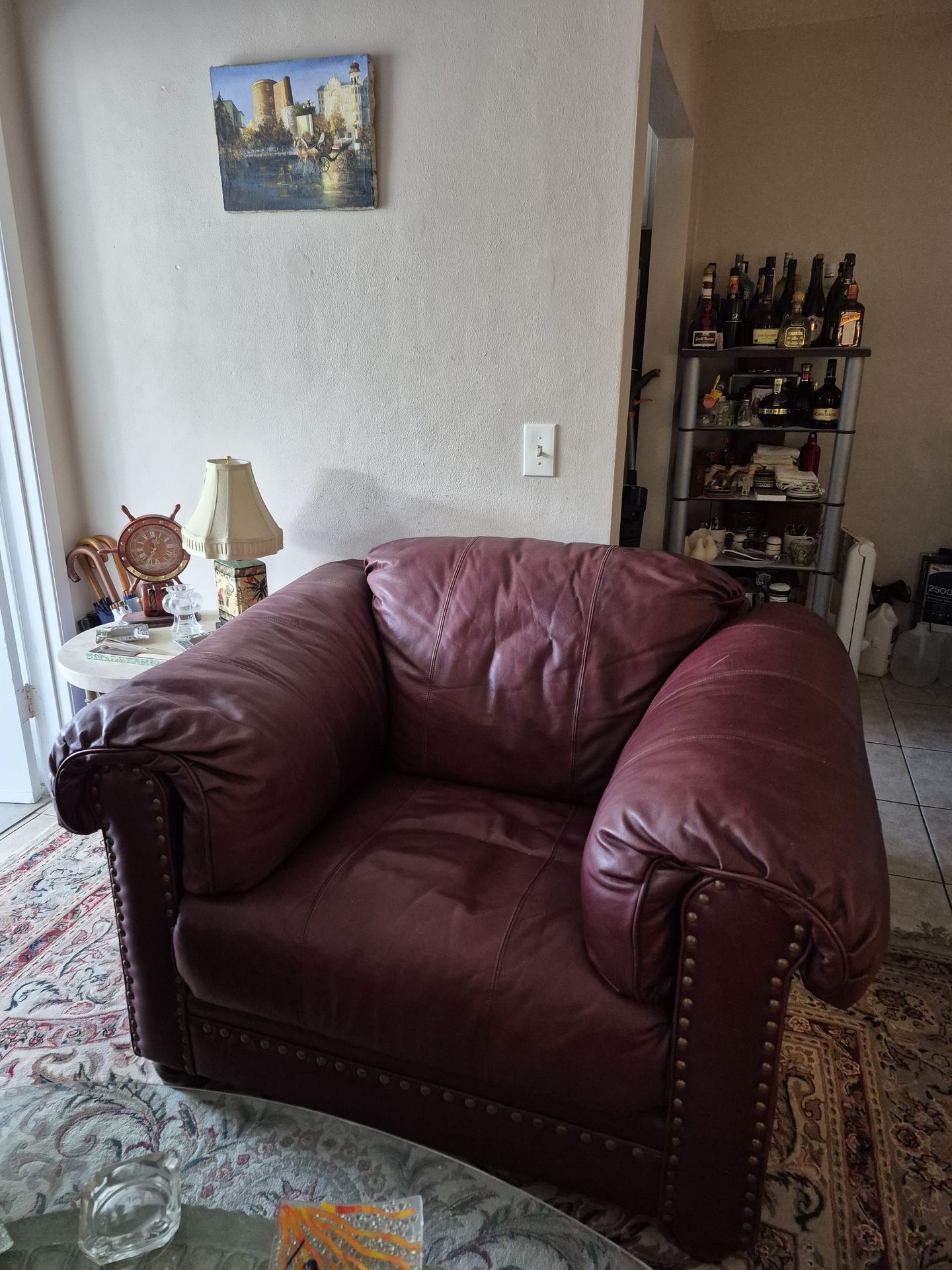 All leather burgundy living room/Bedroom broilhill