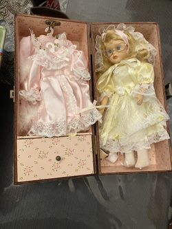 Ceramic doll in case