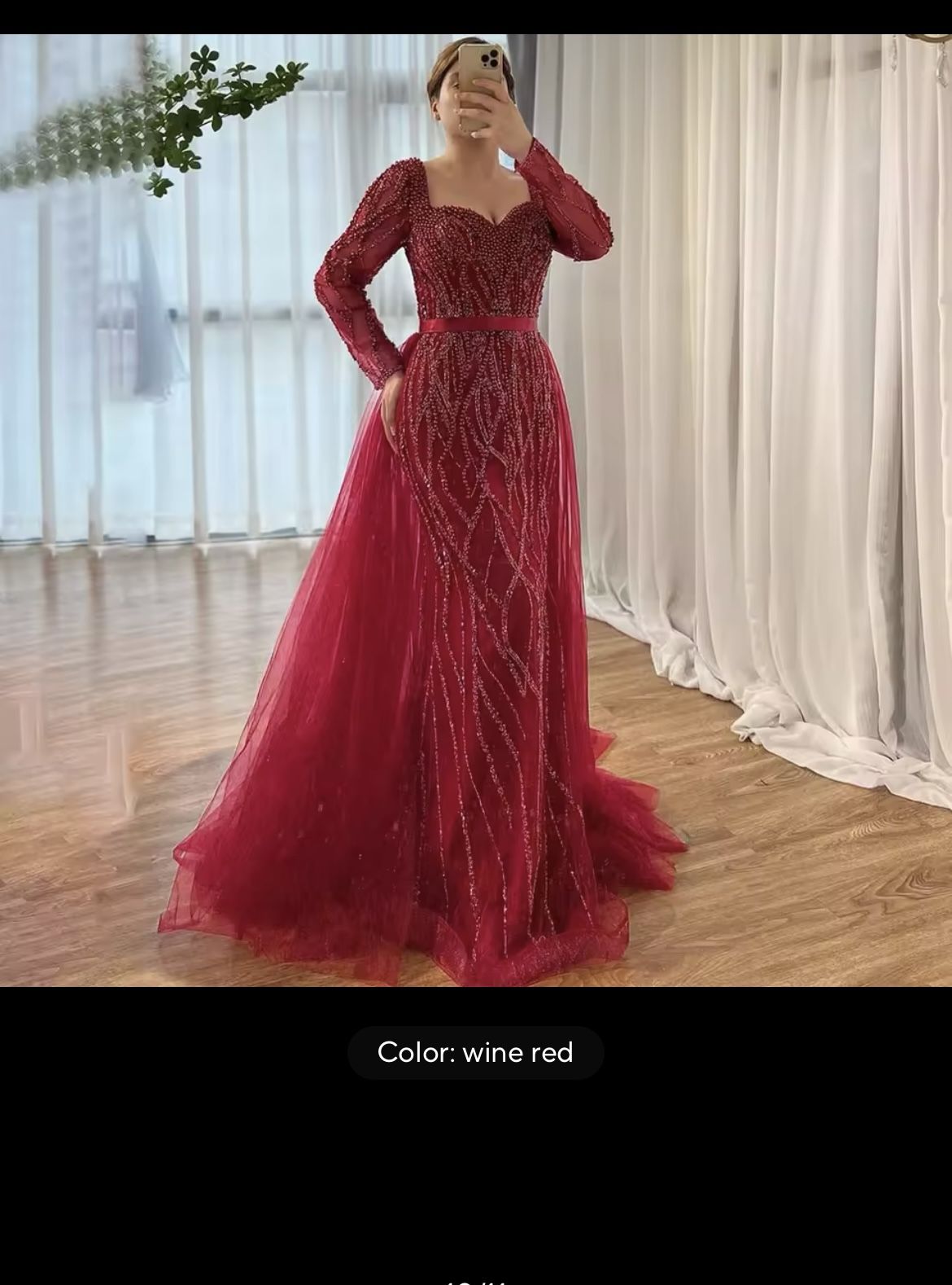 Red long sleeve beaded evening gown with detachable train