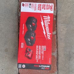 Milwakee 5.0 Batteries / Charger 