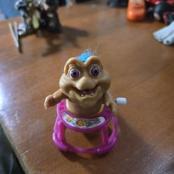 90's Dinosaurs x Trolls Baby Green Walker Wind Up Toy Trinket Figure. 