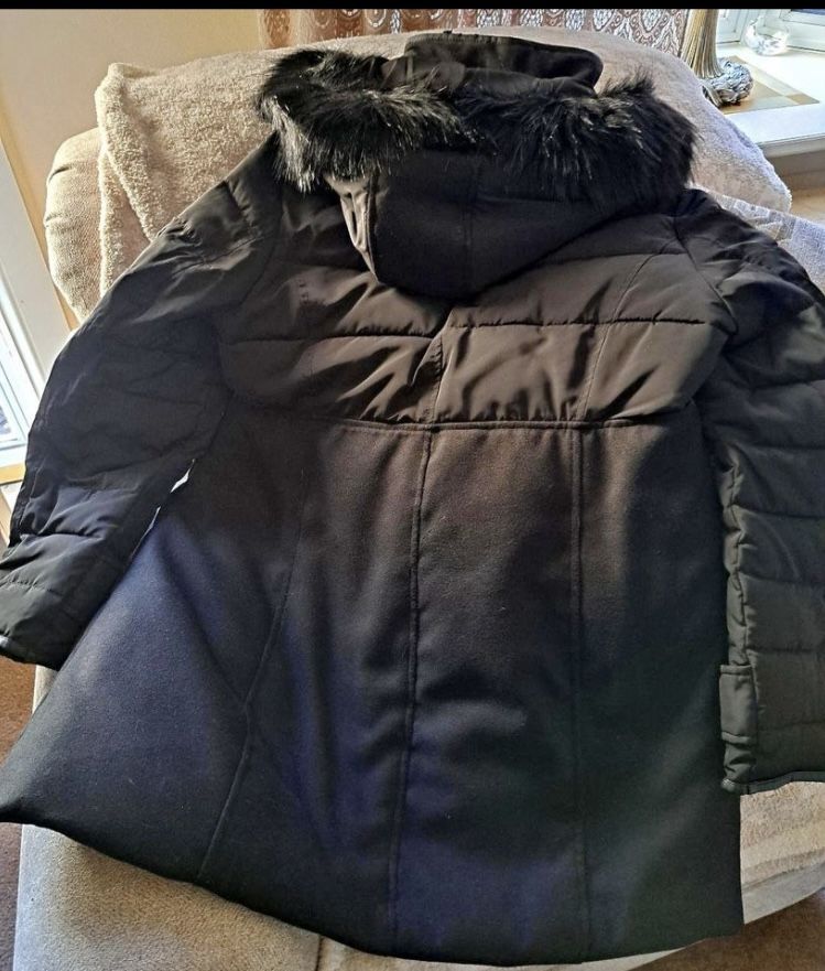 Nicole Miller Ladies Black Winter Coat Removable Faux Fur Hood was 200.00. bought coat at JC Penney never used it. Really warm. Zipper and snap close 