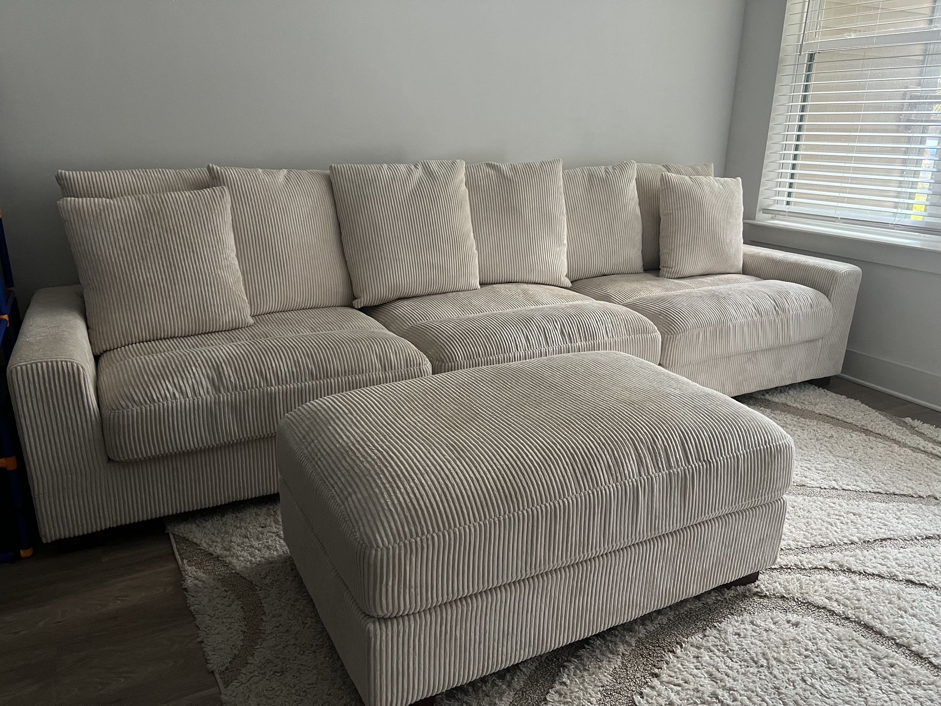 Ivory Sofa w/ Ottoman Included