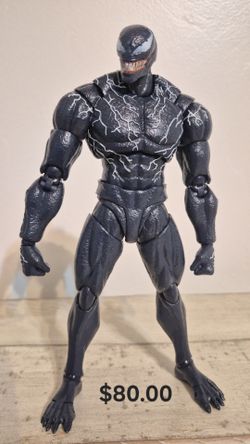 Venom action figure with pieces