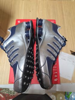 Brand new never worn size 8.5 Nike Shox Sneakers Silver Navy Blue